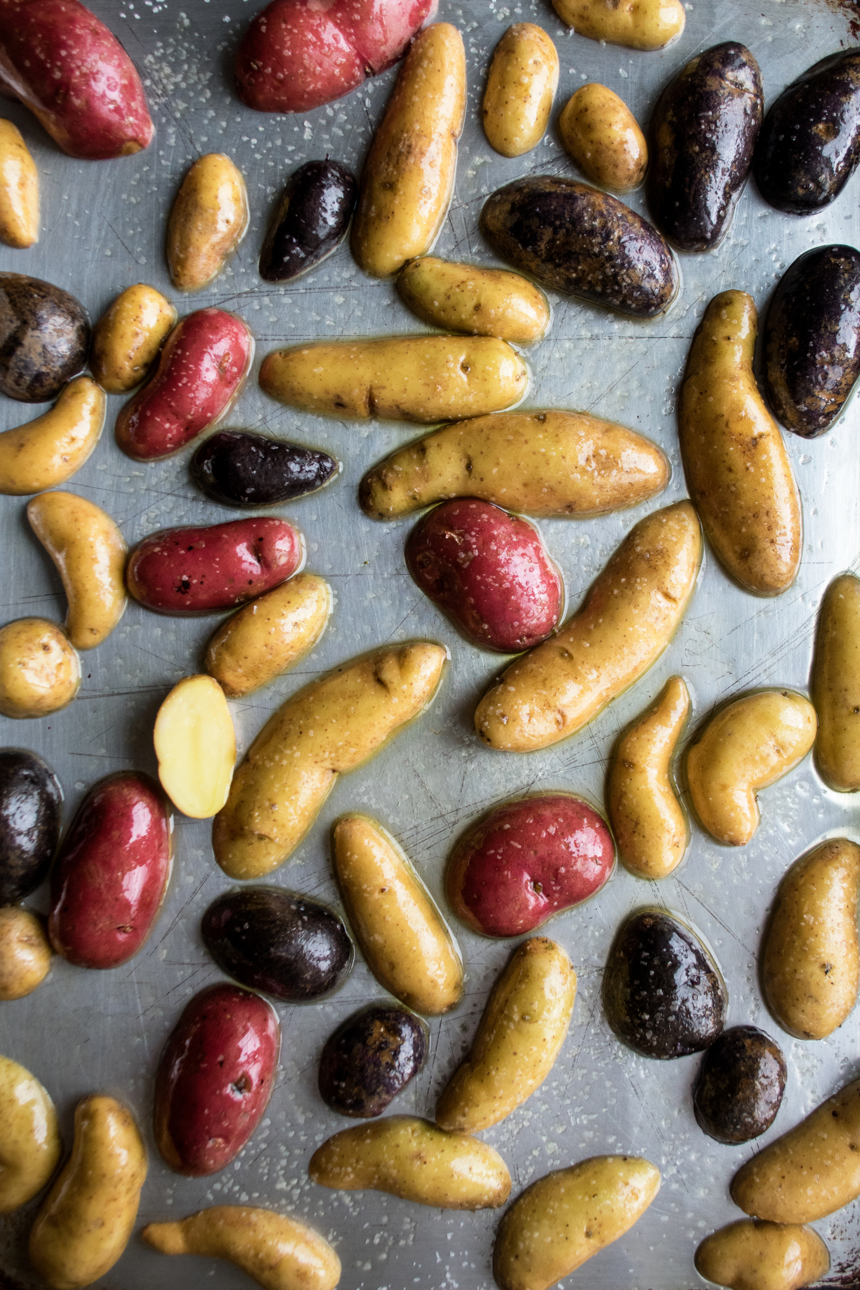 raw potatoes roasting